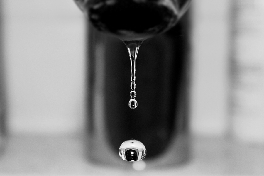 A black & white close-up of a dripping faucet in Mascoutah, Illinois